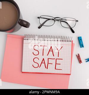 Handwriting text Stay Safe, Business approach secure from threat of danger, harm or place to keep articles Stock Photo