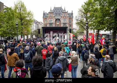 Brussels, Belgium. 01st May, 2023. Illustration picture shows an action 'Tax the rich!' of far left party PVDA - PTB in Brussels, on the first of May, Labour Day, the International Workers' Day, Monday 01 May 2023. BELGA PHOTO HATIM KAGHAT Credit: Belga News Agency/Alamy Live News Stock Photo