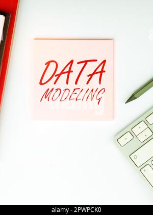 Sign displaying Data Modeling, Business idea process of transferring data between data storage systems Stock Photo