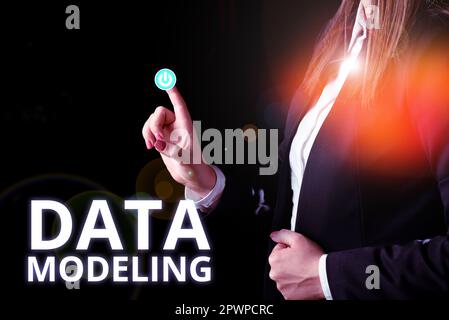 Sign displaying Data Modeling, Business approach process of transferring data between data storage systems Stock Photo