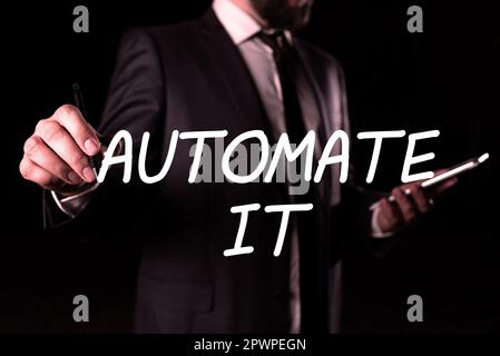 Sign displaying Automate It, Word Written on convert process or facility to be operated automatic equipment. Stock Photo