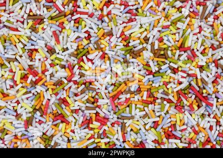 Close up of colorful bar shaped sugar sprinkles Stock Photo