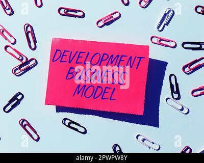 Sign displaying Development Business Model, Word for rationale of how an organization created Stock Photo