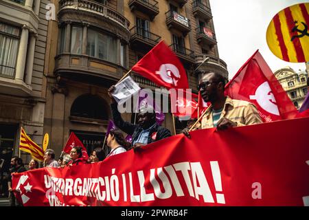 Barcelona, Spain. 1st May, 2023. Communists demonstrate for the working class marching through Barcelona at labor day. Credit: Matthias Oesterle/Alamy Live News Stock Photo