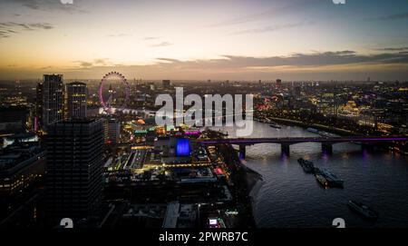 City of London in the evening - aerial view - LONDON, UNITED KINGDOM - DECEMBER 20, 2022 Stock Photo
