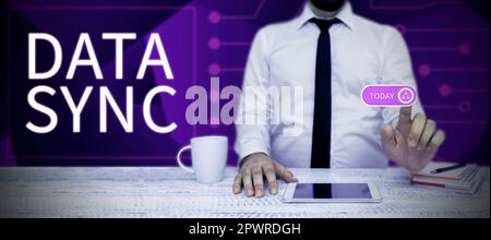 Writing displaying text Data Sync, Conceptual photo data that is continuously generated by different sources Stock Photo