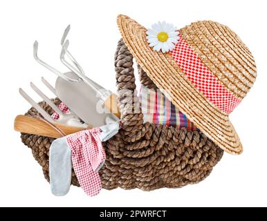 Garden tools and straw hat in a basket isolated on white background Stock Photo