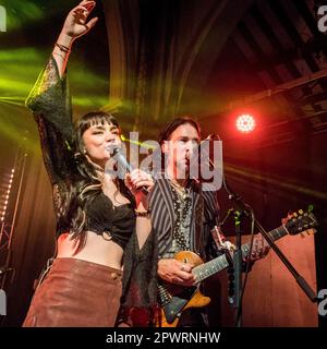 Grace Bond on vocals, Aaron Bond on guitar & vocals Stock Photo