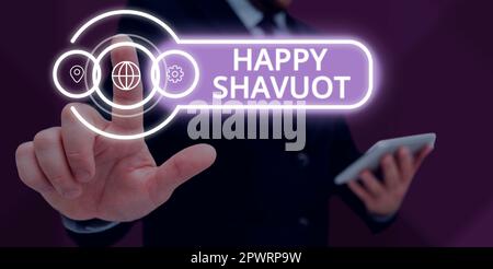 Text showing inspiration Happy Shavuot, Concept meaning Jewish holiday commemorating of the revelation of the Ten Commandments Stock Photo