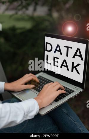 Handwriting text Data Leak, Business concept released illegal transmission of data from a company externally Stock Photo