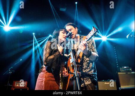 Grace Bond on vocals, Aaron Bond on guitar & vocals Stock Photo