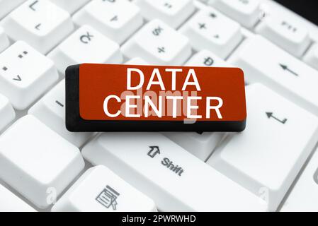 Hand writing sign Data Center, Word Written on a repository that houses computing facilities like servers Stock Photo