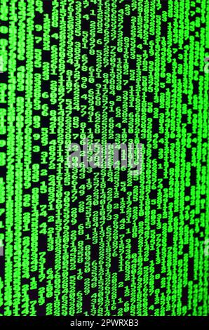 Macro of password selection on the monitor of the office computer. The concept of hacking the protection of a personal data keeper. The stream of supp Stock Photo
