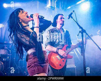 Grace Bond on vocals, Aaron Bond on guitar & vocals Stock Photo