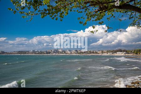 A view across the Mediterranean Sea from Side Old Town towards modern Side with all its tourist resort developments in Antalya Province, Turkey (Turki Stock Photo