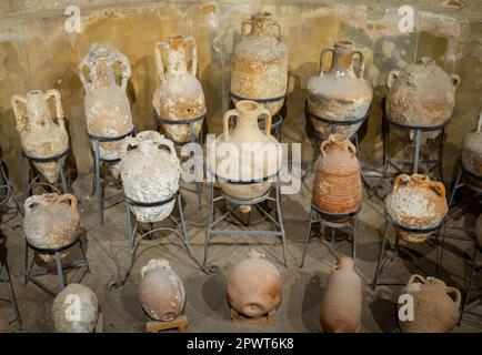 Various amphora dating from 5th century BC until the medieval period on display at the Side Museum in Antalya Province, Turkey (Turkiye). While some o Stock Photo