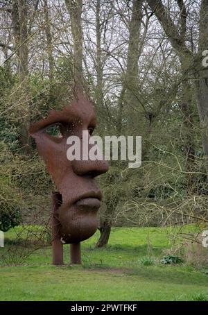 Vertical Face II by Rick Kirby in the Burghley House Estate contemporary Sculture Garden in Spring Stock Photo