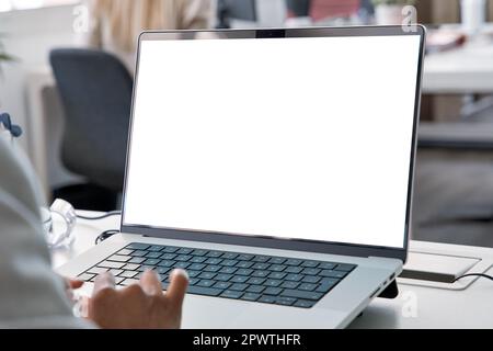 Young business woman working on laptop with blank copy space screen for ad app Stock Photo