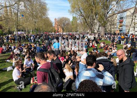 Berlin, Germany. 01st May, 2023. Hundreds of people gather in the sunshine on Mariannenplatz in Berlin-Kreuzberg. Numerous demonstrations and rallies take place in Berlin on Labor Day. Credit: Andreas Rabenstein/dpa/Alamy Live News Stock Photo