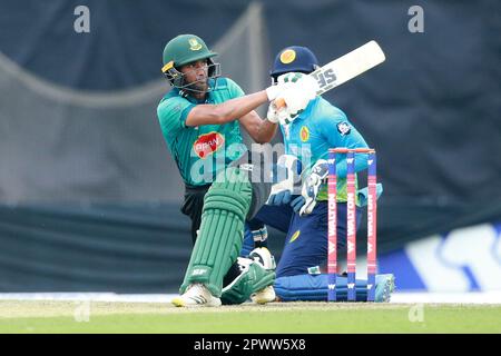 Mohammedan Sporting Club player Mahmudullah bats as Captain Mosaddek Hossain came up with sterling all-round performance as Abahani Limited edged trad Stock Photo