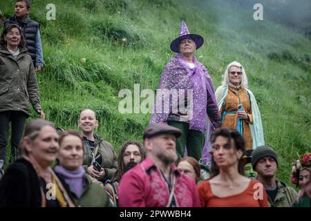 Glastonbury, UK. 1st May 2023. Beltane celebrations and blessings with fire at The Chalice Well as part of a pagan tradition to celebrate the coming of summer. Credit: Guy Corbishley/Alamy Live News Stock Photo