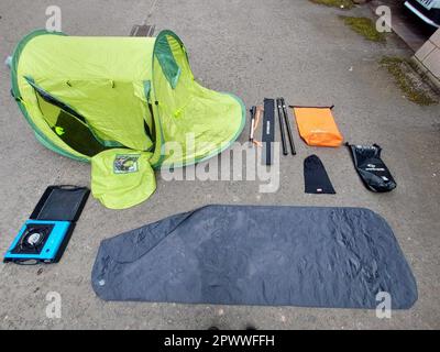 Undated handout photo issued by Police Scotland of camping equipment which was found with two abandoned kayaks in a secluded bay that has sparked a police investigation. Emergency services were alerted to the single-person tent, sleeping bags, kayaks, wetsuit and other items found unattended at a cove on the Angus coast at around 4.30am on Monday. The items were found near Auchmithie Beach, Arbroath, in a cove only accessible from the water or by abseiling down the cliff. Issue date: Monday May 1, 2023. Stock Photo