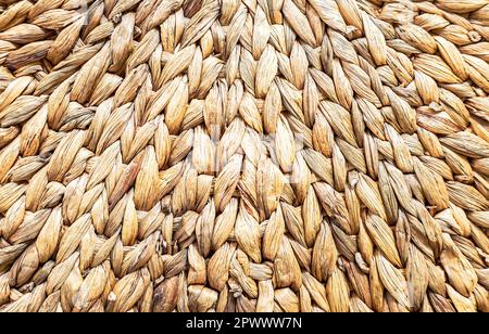 Brown rattan weave for textured background. Straw mat texture. Wicker mat background Stock Photo