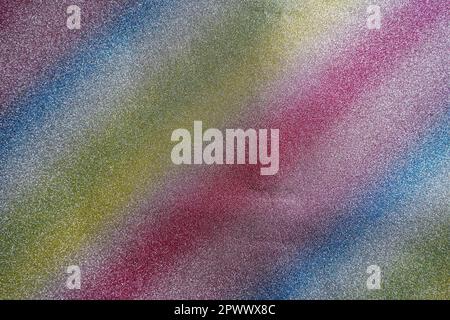 Colored diagonal stripes, sand texture. Rainbow of sand, soft focus. Distribution of colorful abstract background art colors bokeh and blur. Stock Photo
