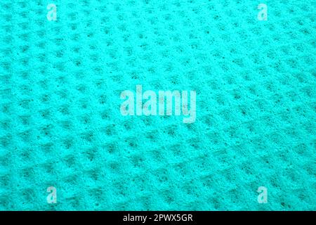 Sponge fibers sponge texture pattern surface close-up green background. Stock Photo