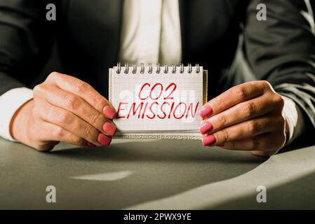 Text sign showing Co2 Emission, Concept meaning Releasing of greenhouse gases into the atmosphere over time Stock Photo