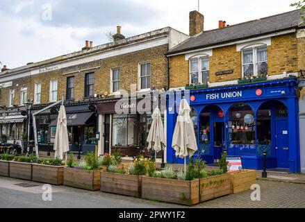 Chislehurst, Kent, UK: Royal Parade, a row of shops and restaurants in Chislehurst with buildings dating from 1870. Chislehurst is in Greater London. Stock Photo