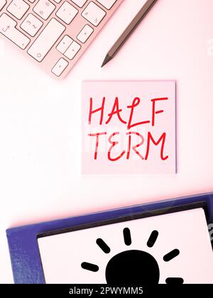 Handwriting text Half Term, Internet Concept half the usual price at which something is offered for sale Stock Photo