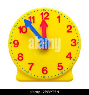 Yellow Plastic Teaching Clock Cut Out on White. Stock Photo