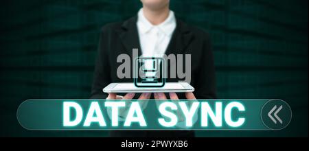 Writing displaying text Data Sync, Business overview data that is continuously generated by different sources Stock Photo
