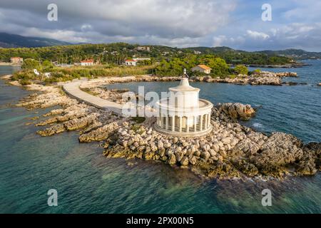 aerial-view-of-saint-theodore-lighthouse-on-a-rocky-peninsula