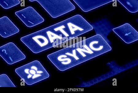Conceptual caption Data Sync, Word for data that is continuously generated by different sources Stock Photo