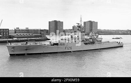 AJAXNETPHOTO. AUGUST, 1974. PORTSMOUTH, ENGLAND - FRIGATE HMS PLYMOUTH DEPARTS NAVAL BASE. ROTHESAY CLASS FRIGATE BUILT AT DEVONPORT DOCKYARD 1959. IN 1982, PLYMOUTH WAS ONE OF FIRST BRITISH WARSHIPS TO ARRIVE IN SOUTH ATLANTIC DURING THE FALKLANDS ISLANDS CONFLICT, TAKING PART IN RECAPTURE OF SOUTH GEORGIA DURING OPERATION PARAQUET.  PHOTO:JONATHAN EASTLAND/AJAX REF:232404 82 Stock Photo