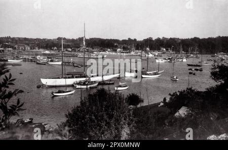 AJAXNETPHOTO. 1950S (APPROX). HAMBLE RIVER, ENGLAND. - BIG CLASS CLASSIC -  THE YACHT LULWORTH (EX TERPSICHORE) CENTRE LEFT VIEWED FROM OLD BURSLEDON HEIGHTS OVERLOOKING BURSLEDON POOL AND (DISTANT), SWANWICK SHORE. YACHT WAS LATER MOORED AT CRABLECK YARD USED AS A HOUSEBOAT BY HUSBAND AND WIFE RICHARD AND RENE LUCAS FOR MANY YEARS BEFORE BEING RESTORED BY NEW OWNERS IN VIAREGGIO, ITALY. YACHT WAS BUILT AS BIG CLASS GAFF-RIGGED CUTTER BY WHITE BROTHERS, ITCHEN FERRY IN 1920 DESIGNED HERBERT WILLIAM WHITE.  PHOTO:SUSANNAH RITCHIE COLLECTION/AJAX  REF:SR195O A3 Stock Photo