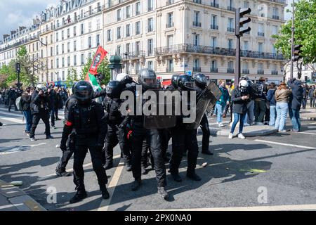 Riot Botan CRS riot police and BRAV-M officers strike protesters during a protest ...