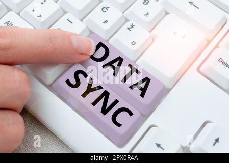 Handwriting text Data Sync, Business idea data that is continuously generated by different sources Stock Photo
