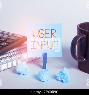 Writing displaying text User Input, Business overview Any information or data that is sent to a computer for processing Stock Photo