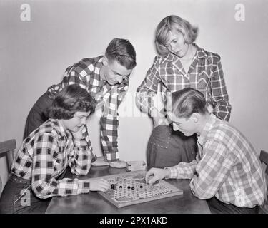 1950s FOUR TEENAGERS TWO BOYS TWO GIRLS ALL WEARING PLAID FLANNEL SHIRTS PLAYING WATCHING GAME OF CHINESE CHECKERS TOGETHER - j3765 LAN001 HARS BROTHER OLD FASHION SISTER 1 JUVENILE STYLE COMMUNICATION FRIEND TEAMWORK COMPETITION JOY LIFESTYLE FEMALES BROTHERS RURAL HOME LIFE COPY SPACE FRIENDSHIP HALF-LENGTH PERSONS MALES TEENAGE GIRL TEENAGE BOY PLAID SIBLINGS SISTERS CHECKERS B&W DATING GOALS HAPPINESS MARBLES HIGH ANGLE LEISURE STRATEGY RECREATION SHIRTS ATTRACTION SIBLING CONNECTION COURTSHIP FLANNEL FRIENDLY STYLISH TEENAGED POSSIBILITY COOPERATION JUVENILES SOCIAL ACTIVITY TOGETHERNESS Stock Photo