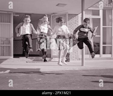 1960s FOUR ENERGETIC KIDS JUMPING TOGETHER HOLDING HANDS RUNNING OUT OF SCHOOL AT THE END OF THE SCHOOL DAY - s13463 HAR001 HARS JOY LIFESTYLE FEMALES HEALTHINESS COPY SPACE FRIENDSHIP FULL-LENGTH PHYSICAL FITNESS END INSPIRATION MALES B&W FREEDOM SCHOOLS GRADE HAPPINESS LEAP LOW ANGLE RECREATION PRIMARY CONNECTION MOTION BLUR ESCAPE FRIENDLY STYLISH K-12 COOPERATION ENERGETIC GRADE SCHOOL GROWTH JUVENILES TOGETHERNESS BLACK AND WHITE CAUCASIAN ETHNICITY CLASSMATES HAR001 OLD FASHIONED Stock Photo