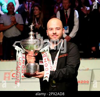 Sheffield, UK. 1st May 2023; The Crucible, Sheffield, England: 2023 Cazoo World Snooker Championship Final; a emotional Luca Brecel celebrates winning the World Championships trophy after beating Mark Selby in the final Credit: Action Plus Sports Images/Alamy Live News Stock Photo