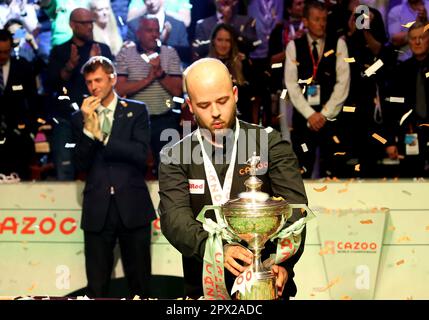 Sheffield, UK. 1st May 2023; The Crucible, Sheffield, England: 2023 Cazoo World Snooker Championship Final; a emotional Luca Brecel celebrates winning the World Championships trophy after beating Mark Selby in the final Credit: Action Plus Sports Images/Alamy Live News Stock Photo