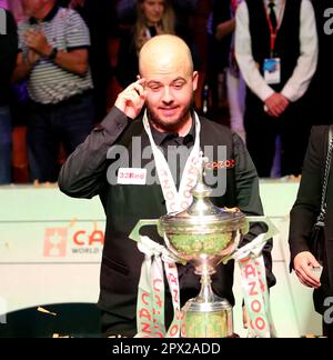 Sheffield, UK. 1st May 2023; The Crucible, Sheffield, England: 2023 Cazoo World Snooker Championship Final;  a emotional Luca  Brecel celebrates winning the World Championships trophy after beating Mark Selby in the final Credit: Action Plus Sports Images/Alamy Live News Stock Photo