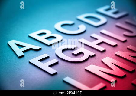 Alphabet detail made with solid letters on a blackboard Stock Photo