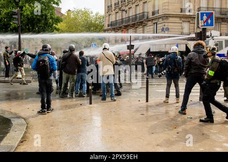 Paris, France. 27th Jan, 2023. Police disperse protesters with water cannons during a demonstration in Nation Square. Demonstrations over the increase in the retirement age (from 62 to 64) continue today on the occasion of May Day (International Labours Day) in Paris, which have turned into clashes between protesters and police. (Credit Image: © Marco Cordone/SOPA Images via ZUMA Press Wire) EDITORIAL USAGE ONLY! Not for Commercial USAGE! Stock Photo