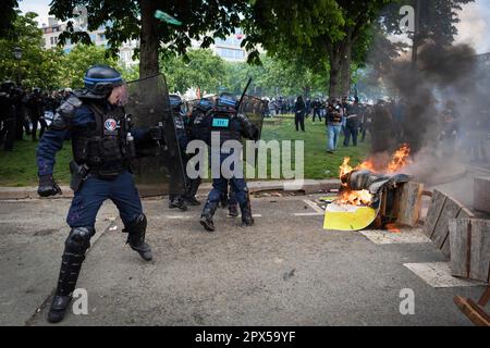 Paris, France. 01st May, 2023. The police charge at the protesters during the demonstration. Thousands turn out for the May Day Rallies. Protests have been seen since Emmanuel Macron introduced the pension reform, which increases the age for retirement from 62 to 64. Historically the 1st of May marks International Labor Day which commemorates labourers and the working class. (Photo by Andy Barton/SOPA Images/Sipa USA) Credit: Sipa USA/Alamy Live News Stock Photo