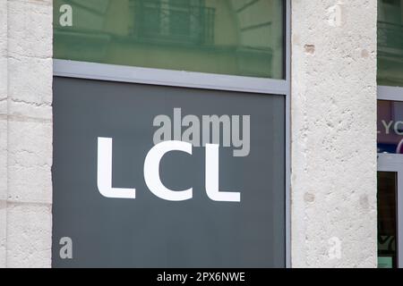 lyon , Aura France - 04 24 2023 : LCL logo brand and sign text windows facade front entrance bank signage Stock Photo